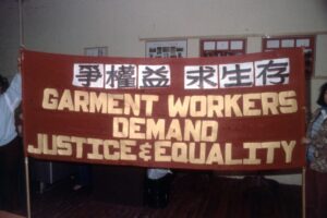 photo of banner reading "garment workers demand justice and equality"